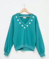 THEA V-NECK TEAL STARS SWEATER